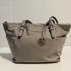 Michael Kors Gray Tote Bag with free Maurice’s wallet. Inside clean.